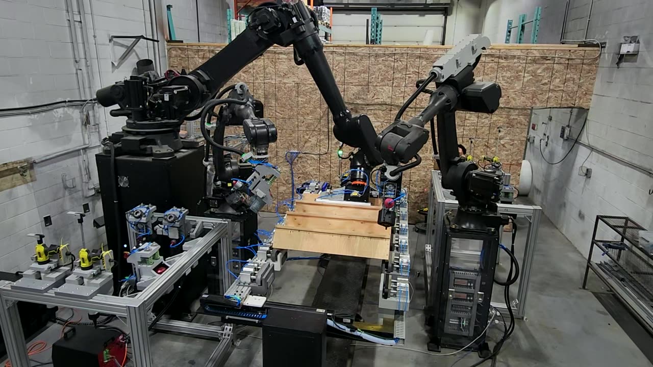 The three-robot prototype cell